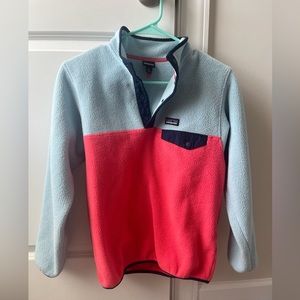 Patagonia kids synchilla snap up. Size L (12) light blue, navy and pink.